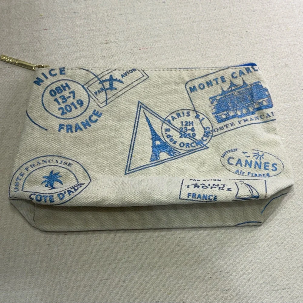 Lancôme Paris canvas cosmetic bag - blue passport stamp design